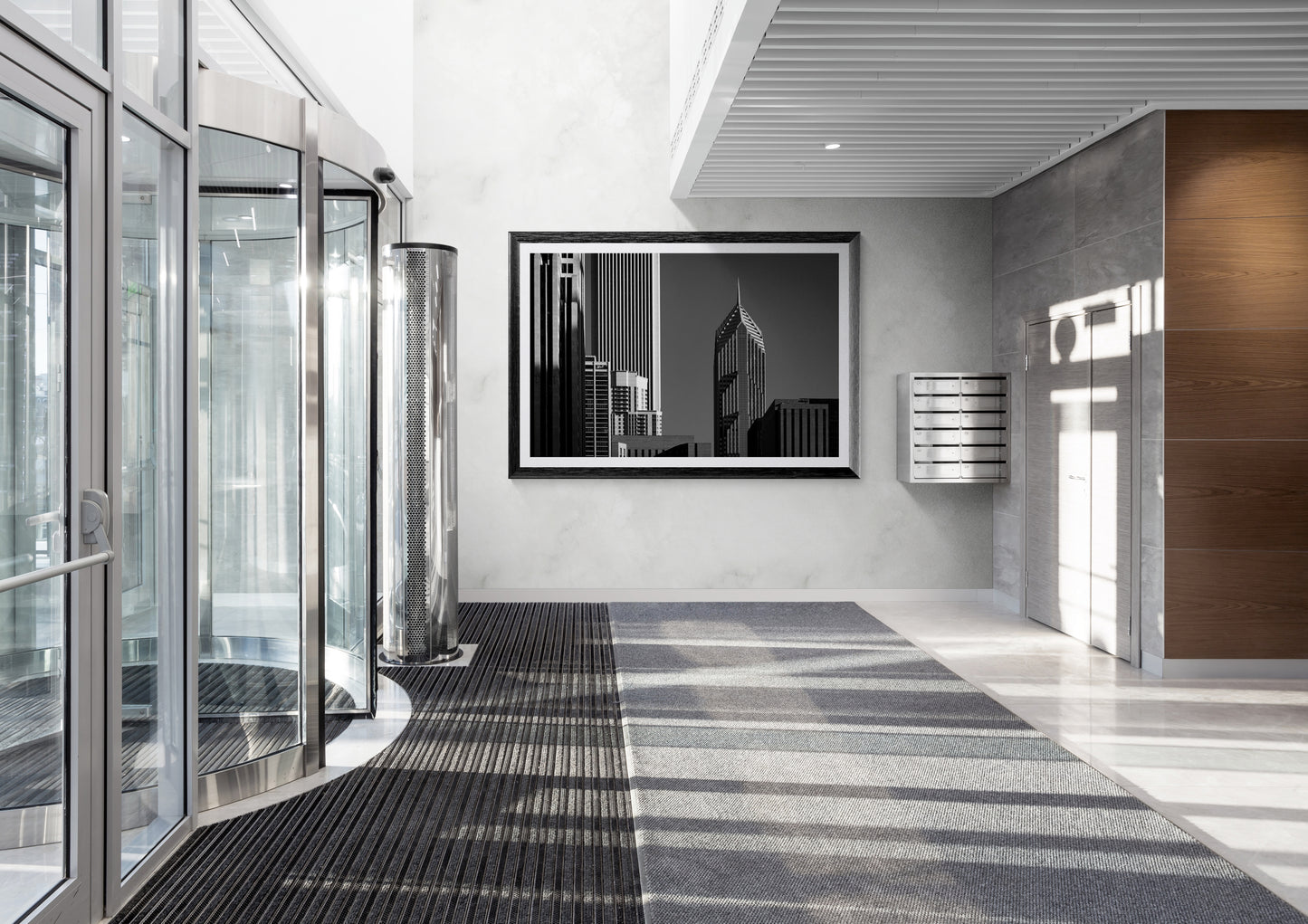 Corporate Gothic black and white Chicago architecture photograph displayed as framed wall art in a commercial lobby.