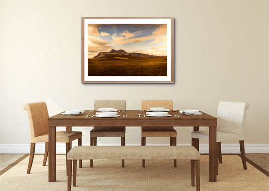 Framed Cùl Mòr Highland landscape print displayed in a dining room, part of Scotland North Coast 500 visual artwork collection for home decor.