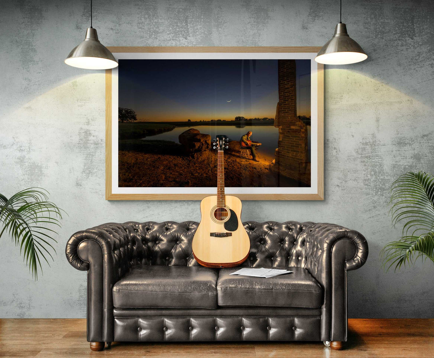 Dream Big fine art photo above leather sofa with guitar decor. Perfect for music-themed interiors and rustic Americana-inspired home design.