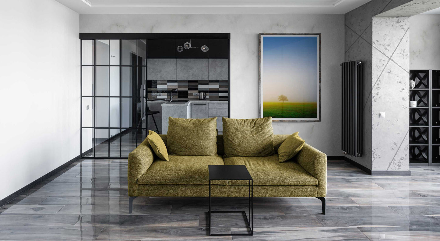 Emergence: Lone Tree in Morning Fog – framed fine art photo in a modern living room. Texas foggy pasture scene complements contemporary interior design.