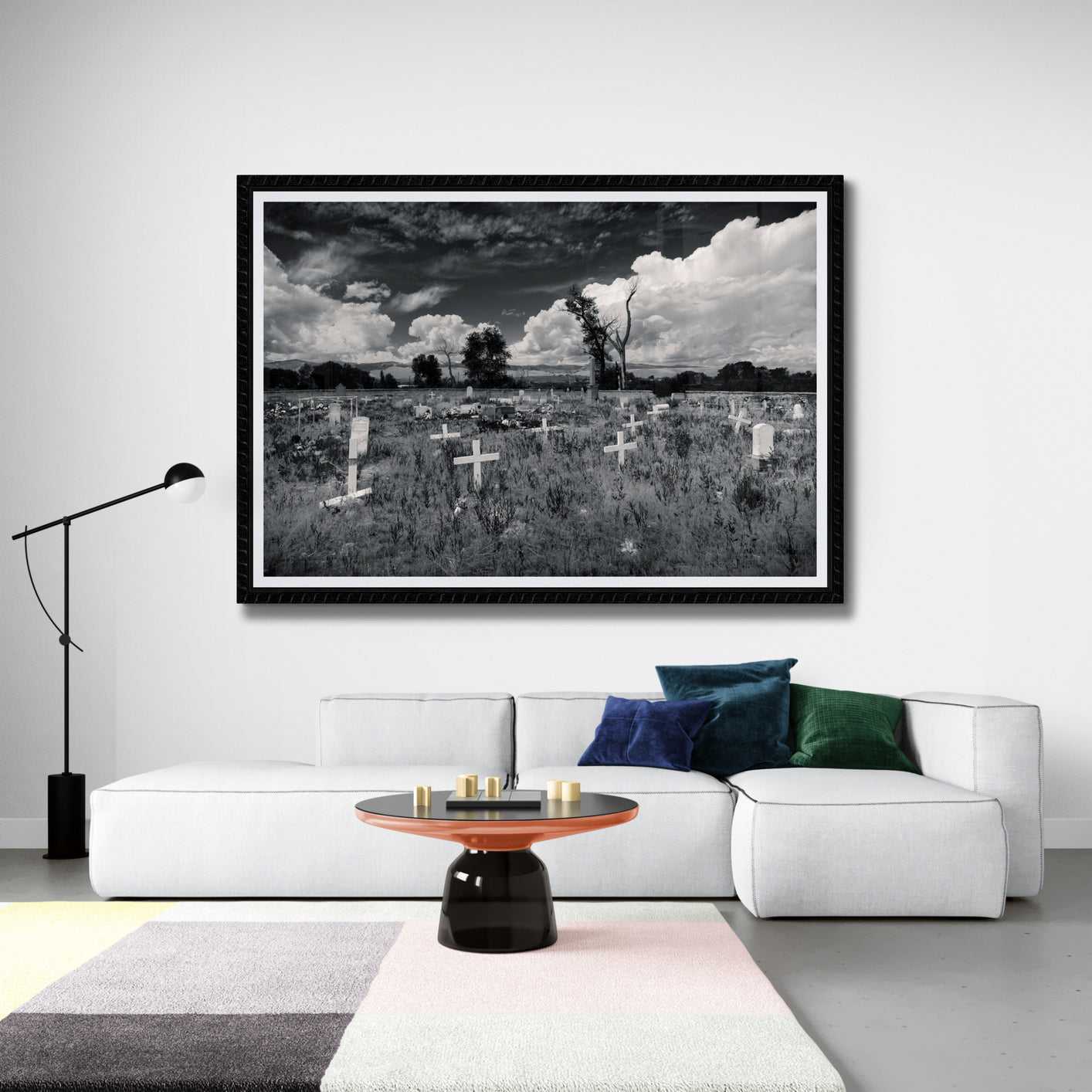 Large Fort Washakie Cemetery art print in minimalist living room, highlighting Wyoming's big sky and Native American history in monochrome.