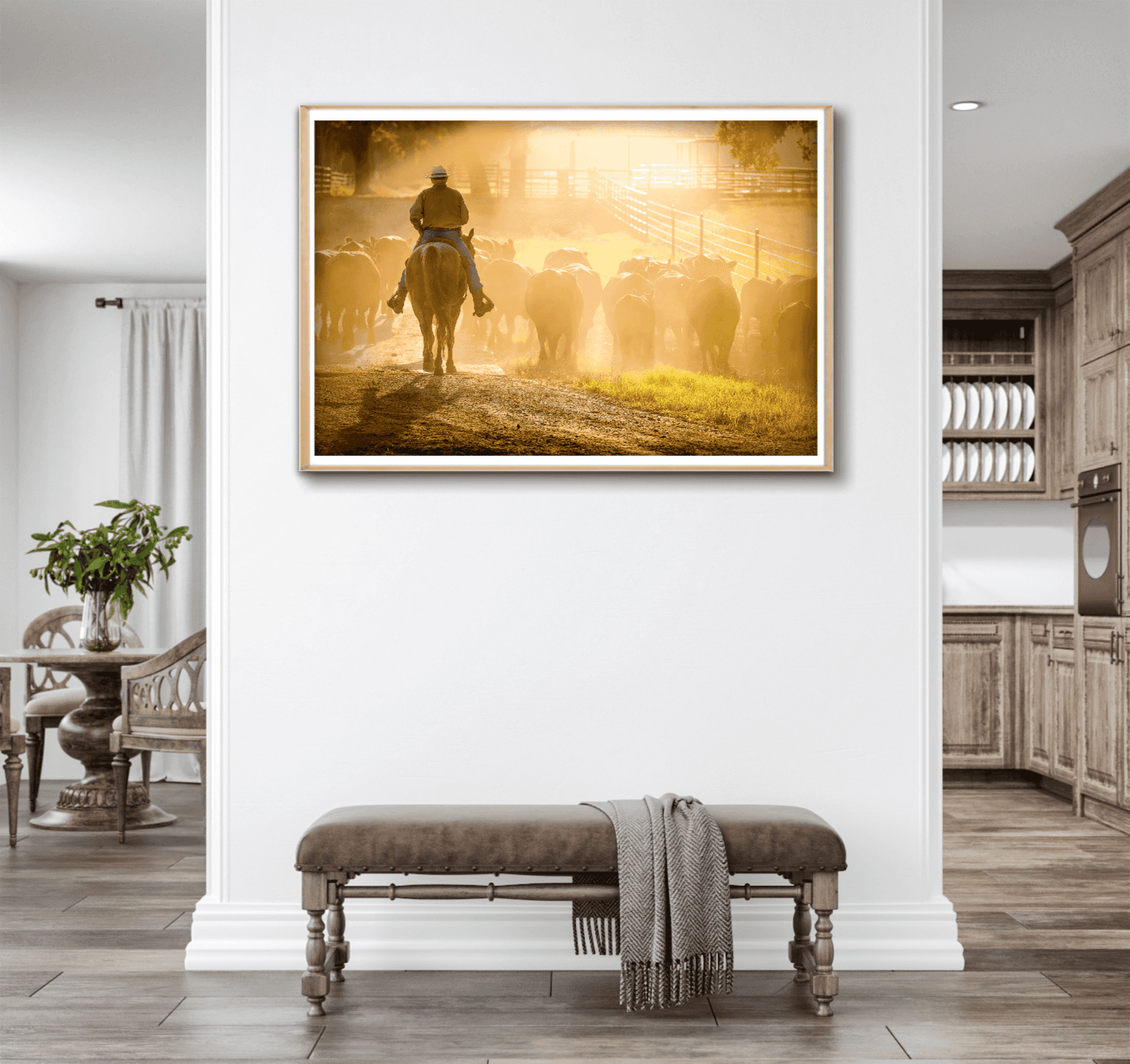 Golden Hour Roundup – Texas Cowboy and Cattle at 44 Farms displayed in a bright modern hallway. Western lifestyle photography as elegant wall art.