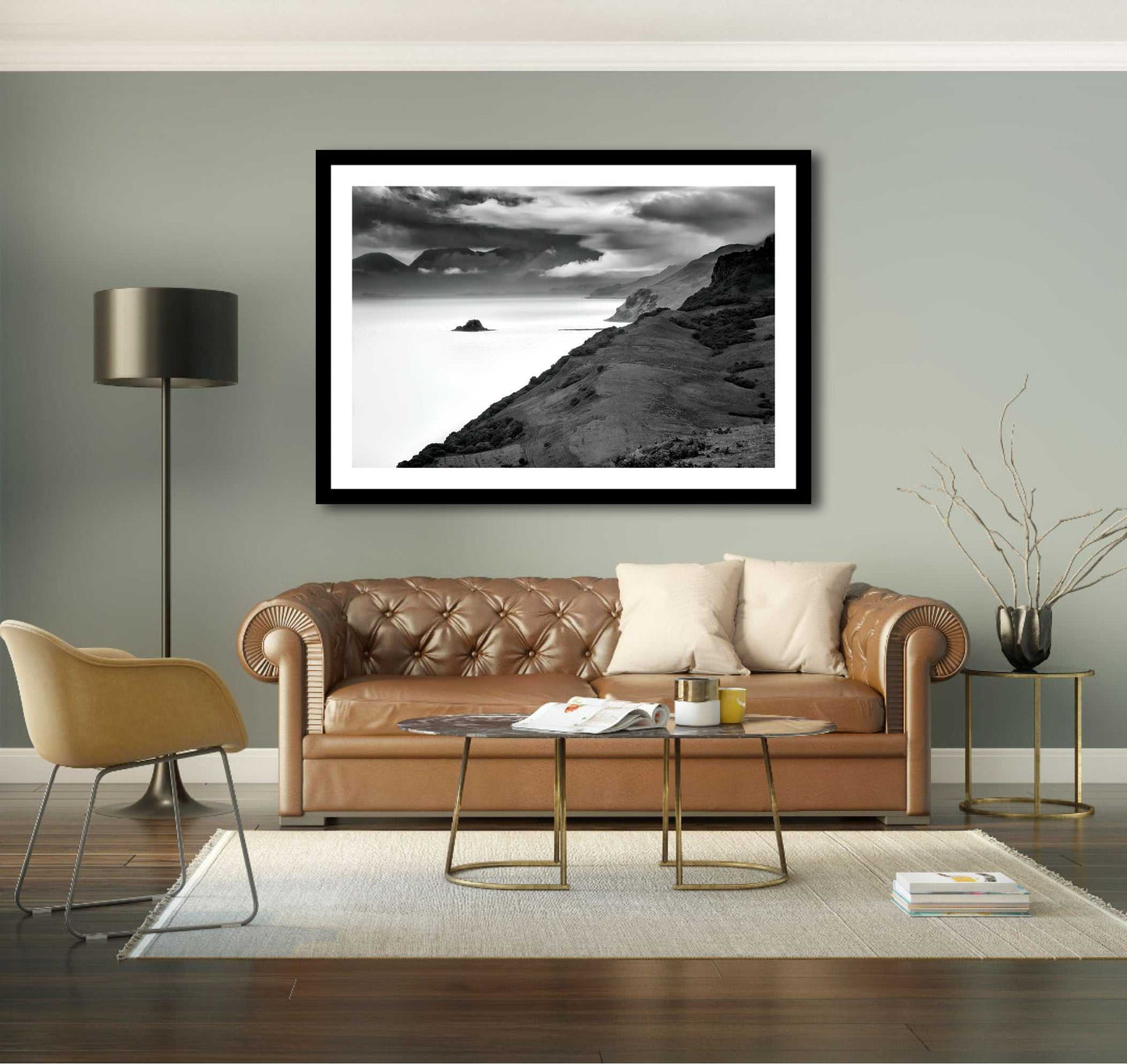 Holm Island – Black & White Fine Art Print above a leather sofa in a cozy living room, perfect for Scottish Highlands-inspired home decor.
