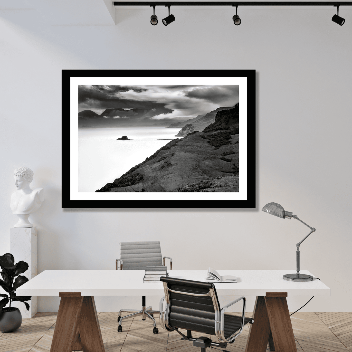 Framed Holm Island – Black & White Fine Art Print displayed in a modern office, ideal for interior designers seeking Scottish landscape wall art.