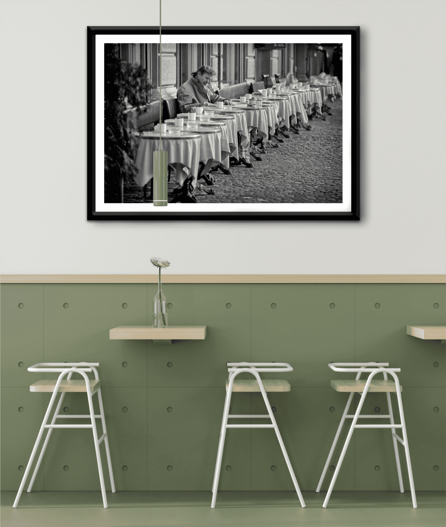 Zurich Series #3 – The Man at the Café, Zurich in Black and White – Fine Art Print by Michael Hart displayed in a modern kitchen café. A striking black and white artwork perfect for contemporary home or restaurant decor.