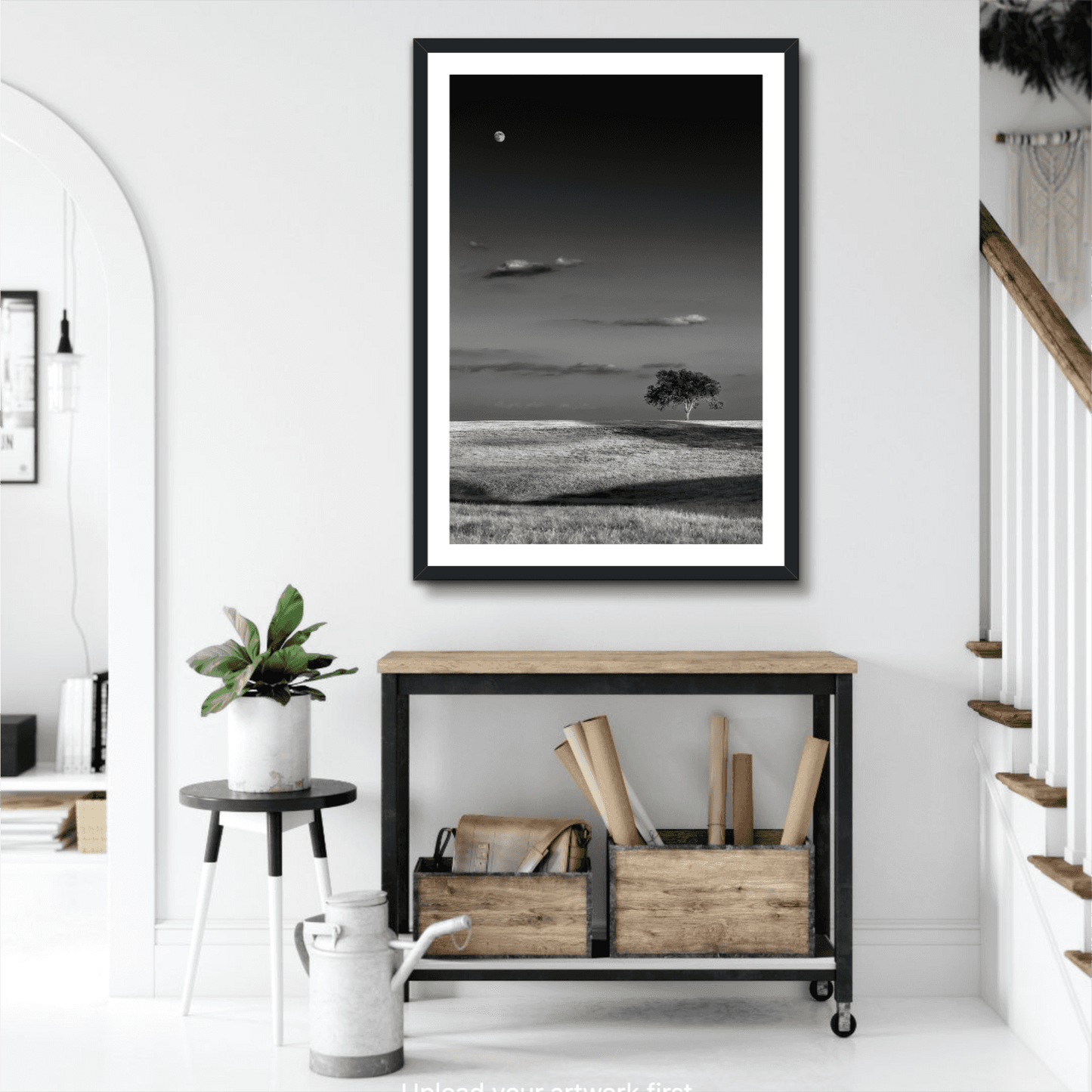 Moonrise at Sunset – Black and White Texas Landscape Print by Michael Hart showcased in a bright entryway above a rustic console table.