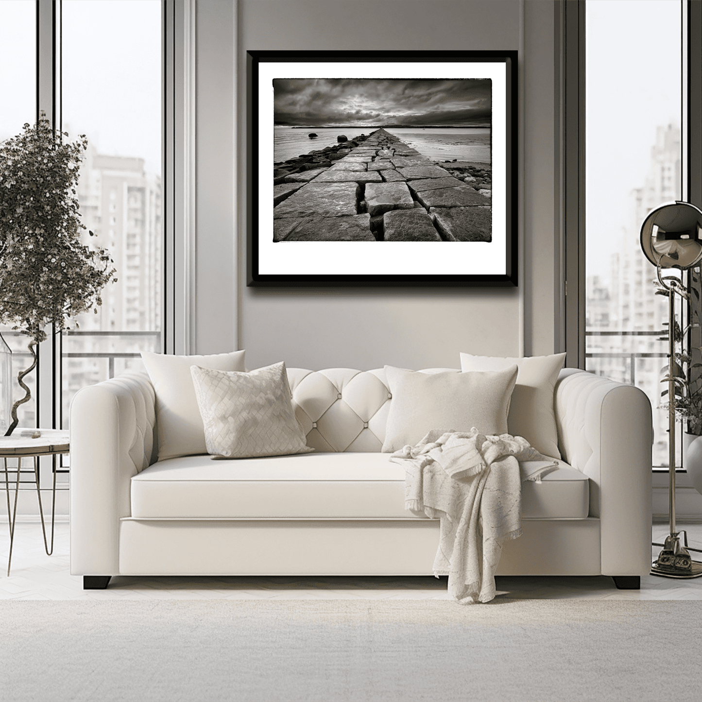 Breakwater, Rockland ME – Award-Winning Black & White iPhone Photo, Limited Edition Print displayed in modern living room. Dramatic granite jetty scene adds moody elegance to luxury interior decor.