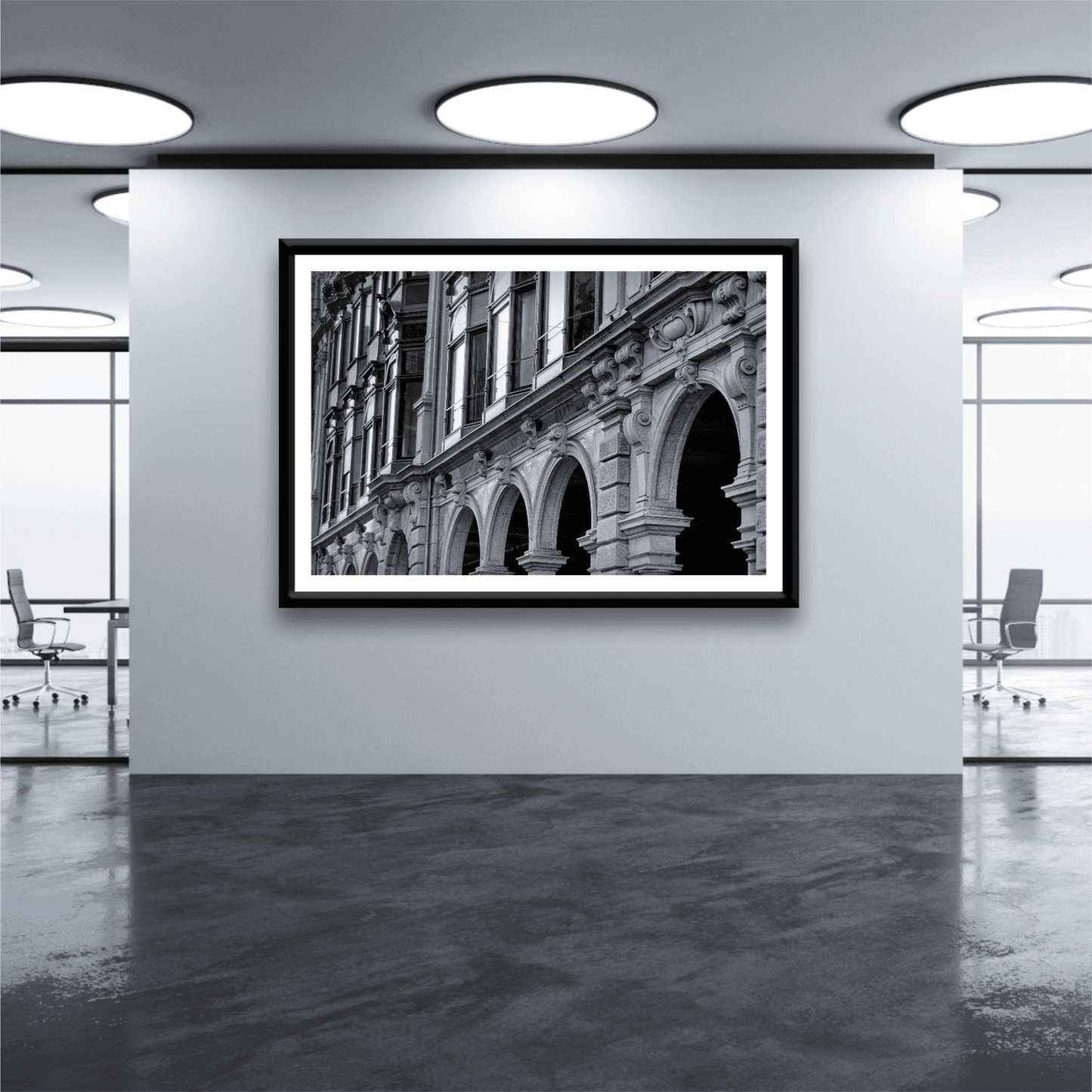 Zurich Series #4 – The Architecture Speaks fine art print by Michael Hart mounted in a modern office gallery, highlighting Zurich's historic facade in black and white.