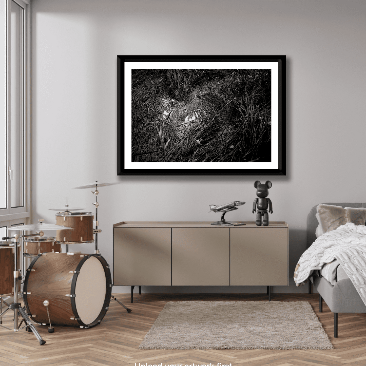 'Water & Reeds – A Scene in Acadia National Park in Black and White' framed print showcased in a modern music-themed room with a drum set and decor.