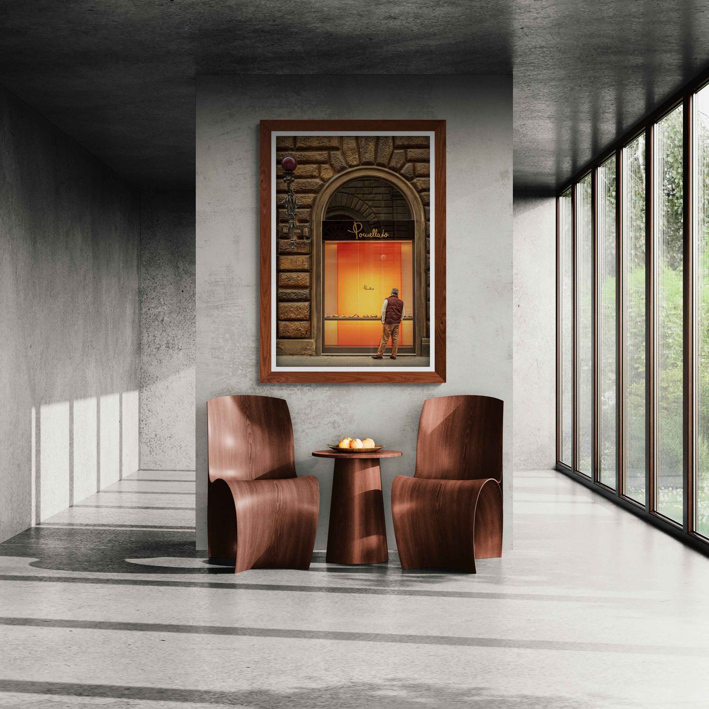 Modern interior with wooden chairs, small table, and framed fine art photo of man shopping in Florence on concrete wall, natural light from large windows