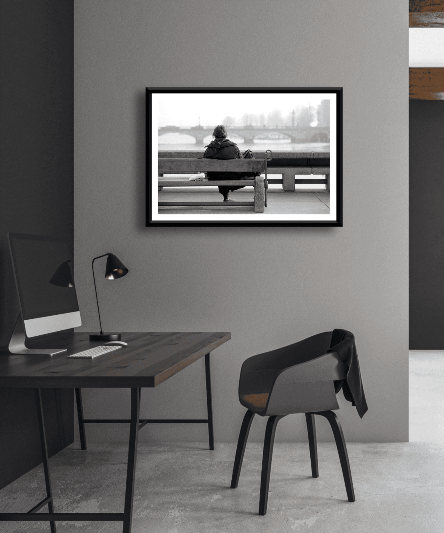 Zurich Series #6 – The Woman Overlooking the River Limmat monochrome art print by Michael Hart in a modern home office setting. A minimalist European cityscape perfect for contemporary workspace decor.